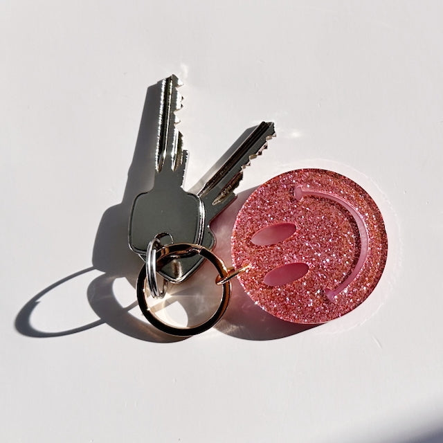 Schlüsselanhänger Happy, rosa glitzer