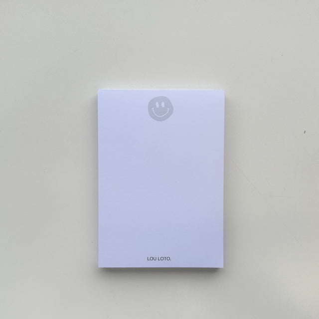 Notizblock A6, Smiley grau