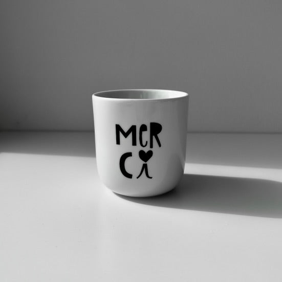 Porzellanbecher Merci